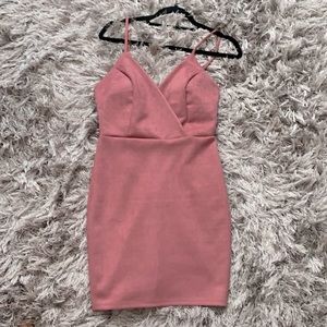 Boutique tag still on. Nice rose or emerald green colored dresses.